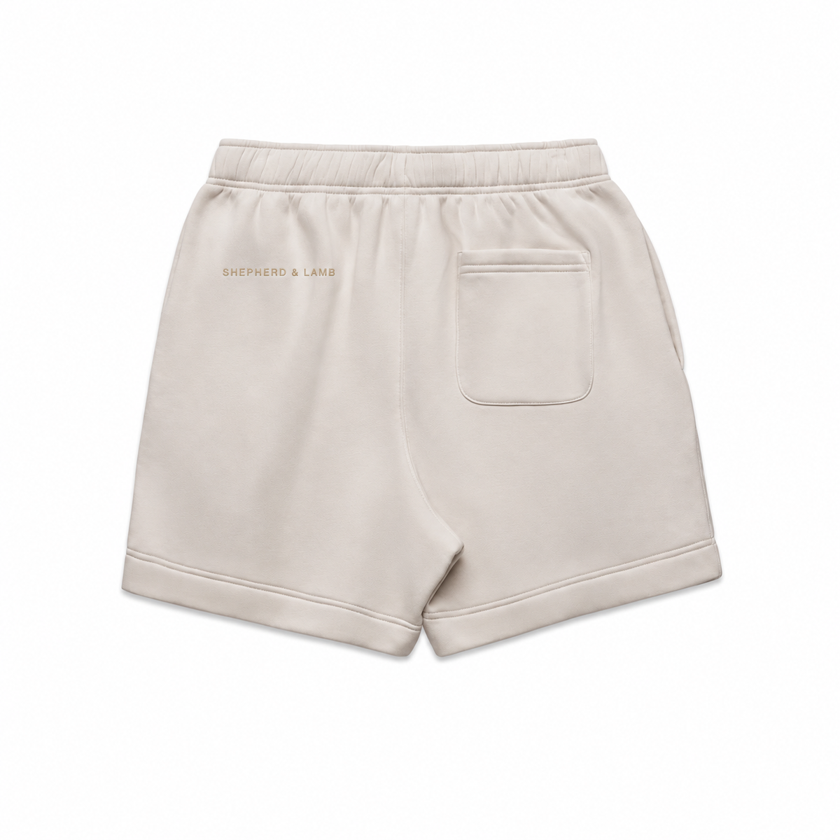 Back view of the Shepherd & Lamb Signature Relax Track Shorts in Bone, showing the rear Shepherd & Lamb wordmark.
