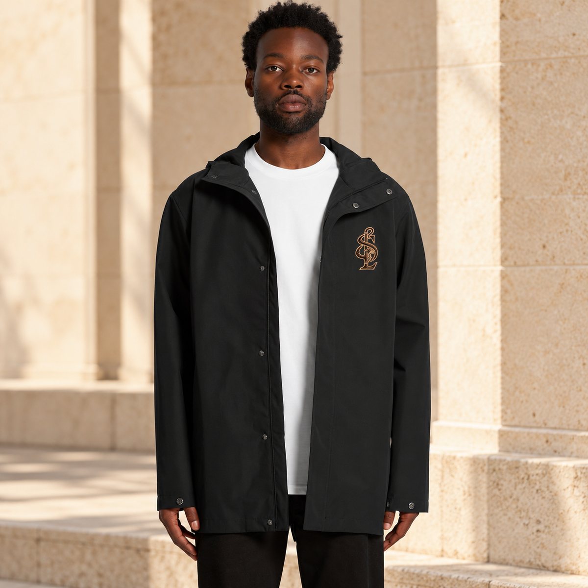 Model wearing the Shepherd & Lamb Signature Tech Jacket in Black, showing the front design and fit.